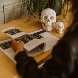 Stef flipping through printed training materials